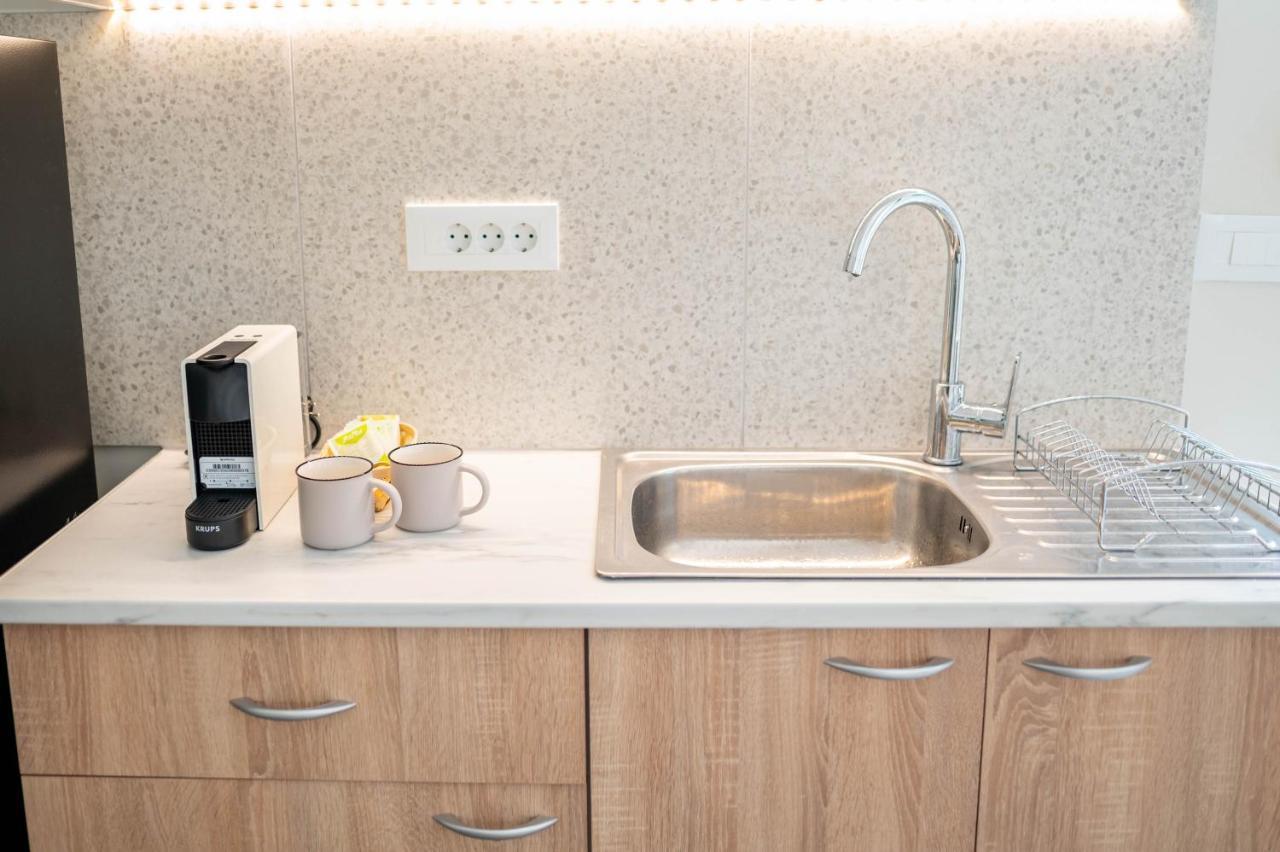Kosnian City Suites B Bagian luar foto